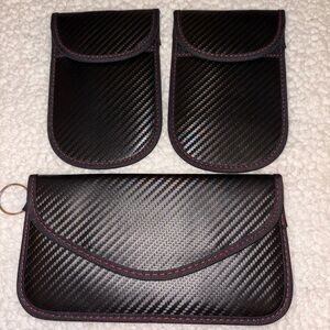 Three carbon fiber pouches w/keychains for Car registration, papers, etc. nwt